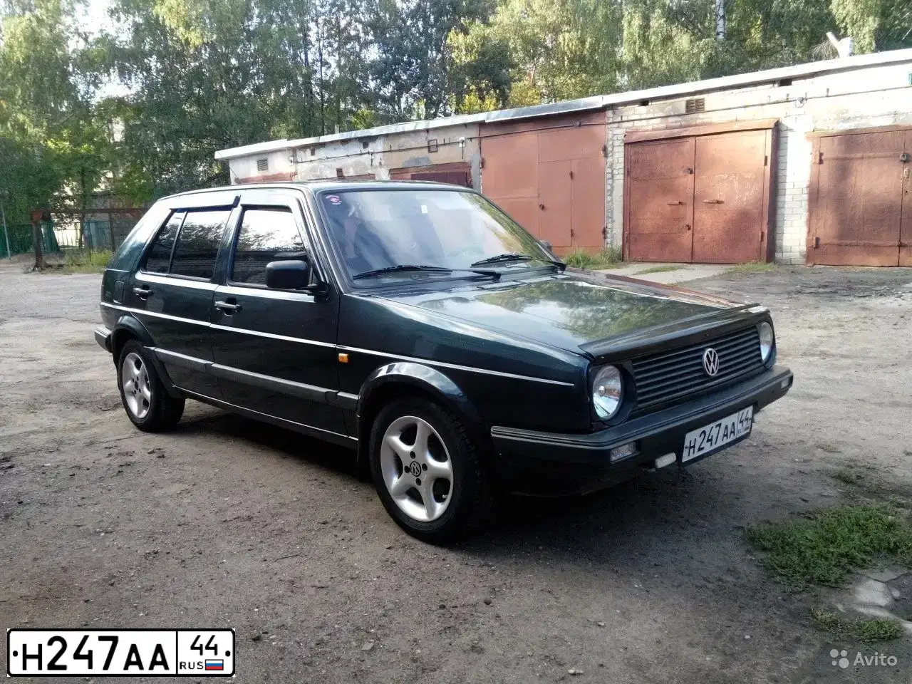 Фото автомобиля VOLKSWAGEN GOLF, 1991 — госномер Е959КА39. Цвет: ТЕМНО - СИНИЙ