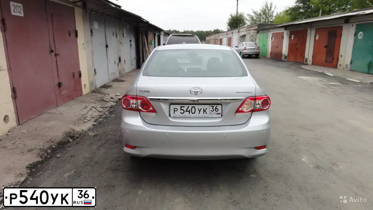 Фото автомобиля TOYOTA COROLLA, 2012 — госномер Р540УК36. Цвет: серебристый