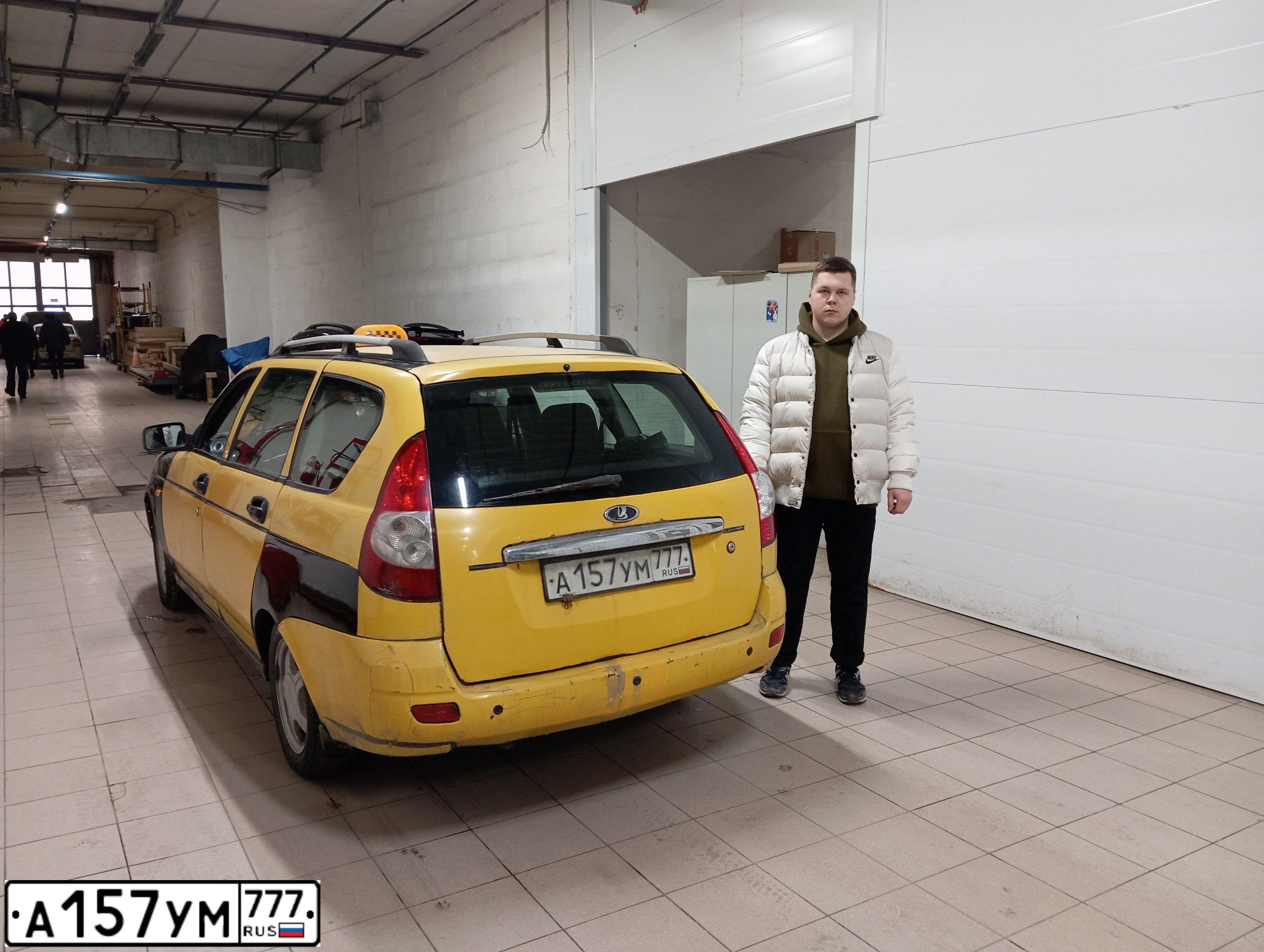 Фото автомобиля LADA 2171 PRIORA, 2009 — госномер А157УМ777. Цвет: ЖЕЛТЫЙ