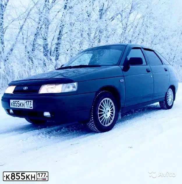 Фото автомобиля LADA 2112 LADA, 2006 — госномер Е001ВН40. Цвет: ЗОЛОТИСТЫЙ ТЕМНО-ЗЕЛЕНЫЙ