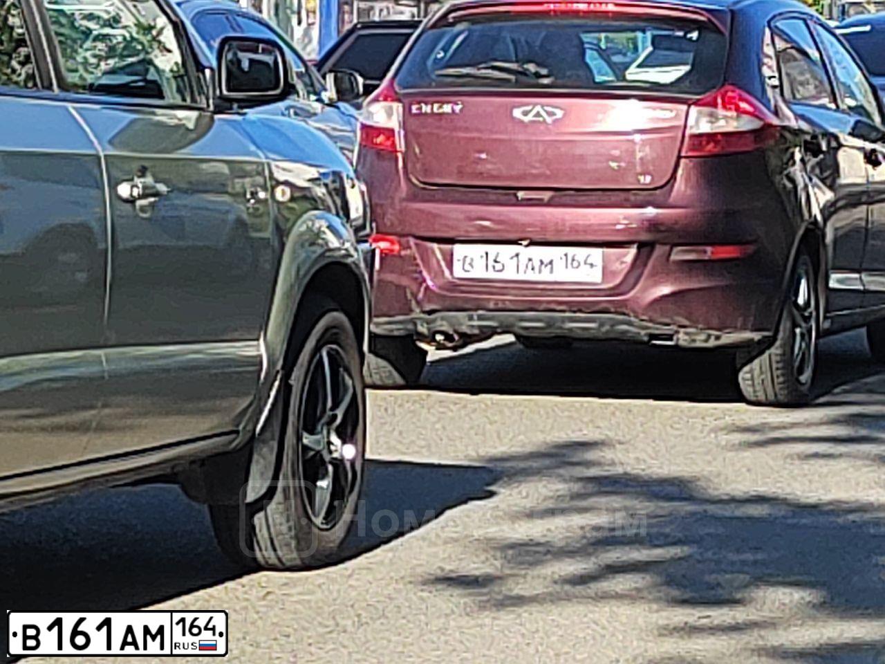 Фото автомобиля CHERY BONUS /A13/, 2013 — госномер В161АМ164. Цвет: Красный