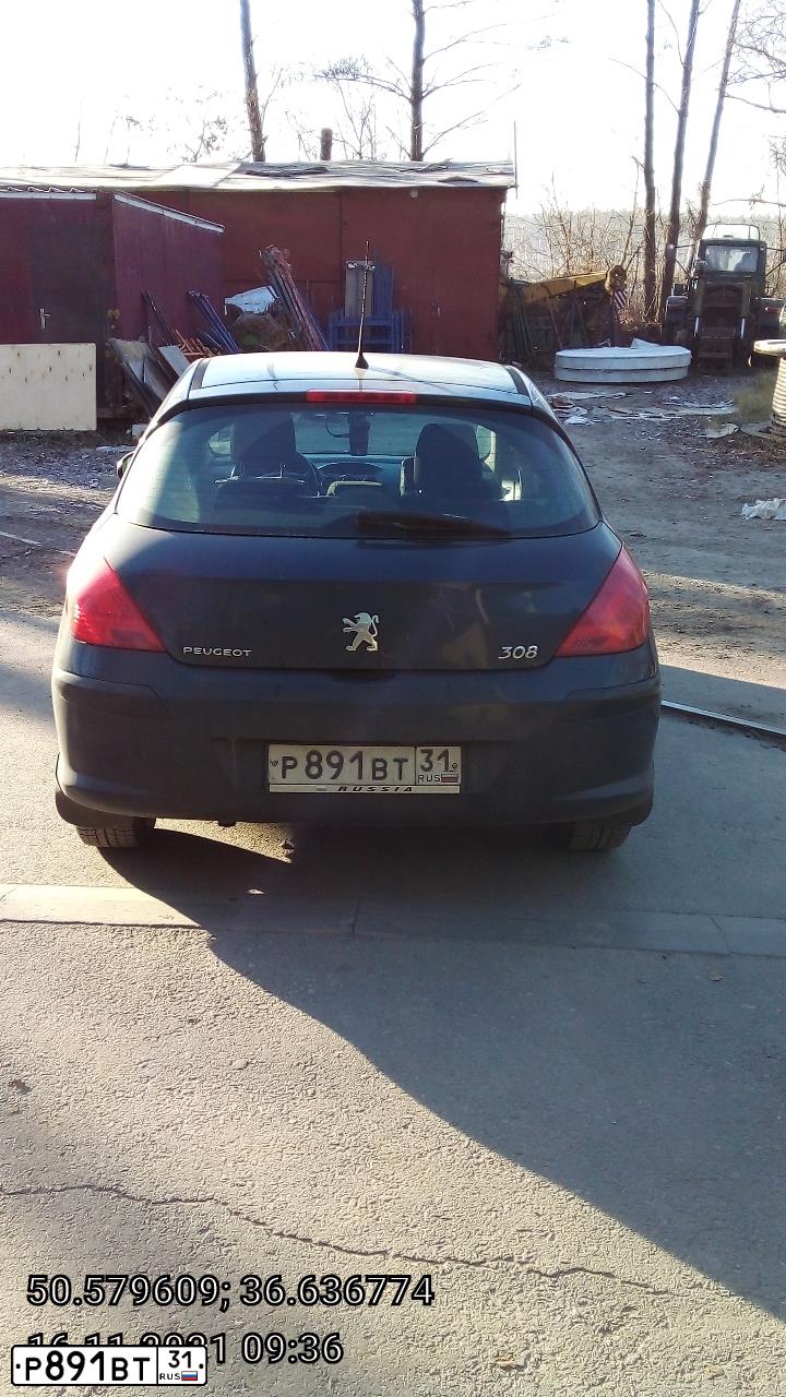 Фото автомобиля PEUGEOT 308, 2010 — госномер О400ВС21. Цвет: ТЕМНО-СИНИЙ
