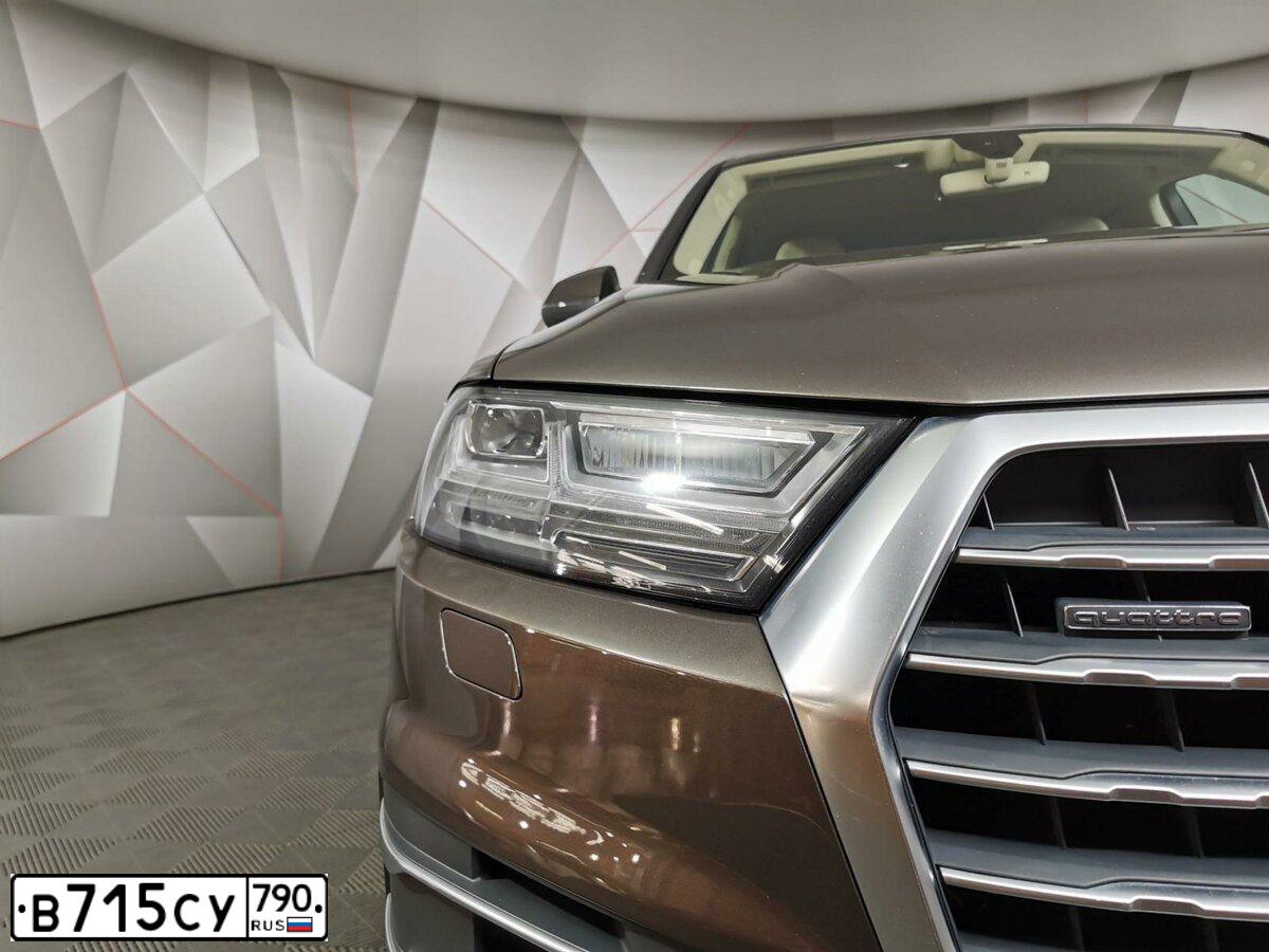 Фото автомобиля AUDI Q7, 2016 — госномер М773НС30. Цвет: Коричневый
