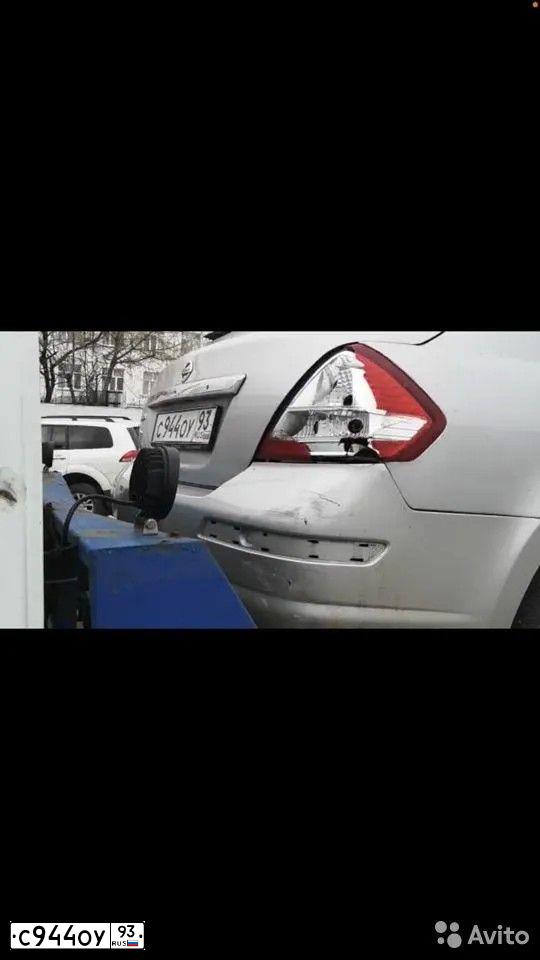 Фото автомобиля NISSAN TIIDA, 2008 — госномер Е162МУ193. Цвет: Серебристый