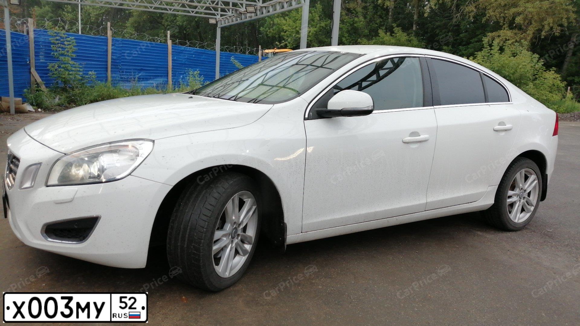Фото автомобиля FORD FOCUS, 2008 — госномер Х003МУ52. Цвет: КРАСНО-ОРАНЖЕВЫЙ