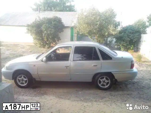 Фото автомобиля DAEWOO NEXIA, 1997 — госномер А187НР123. Цвет: БЕЖЕВЫЙ