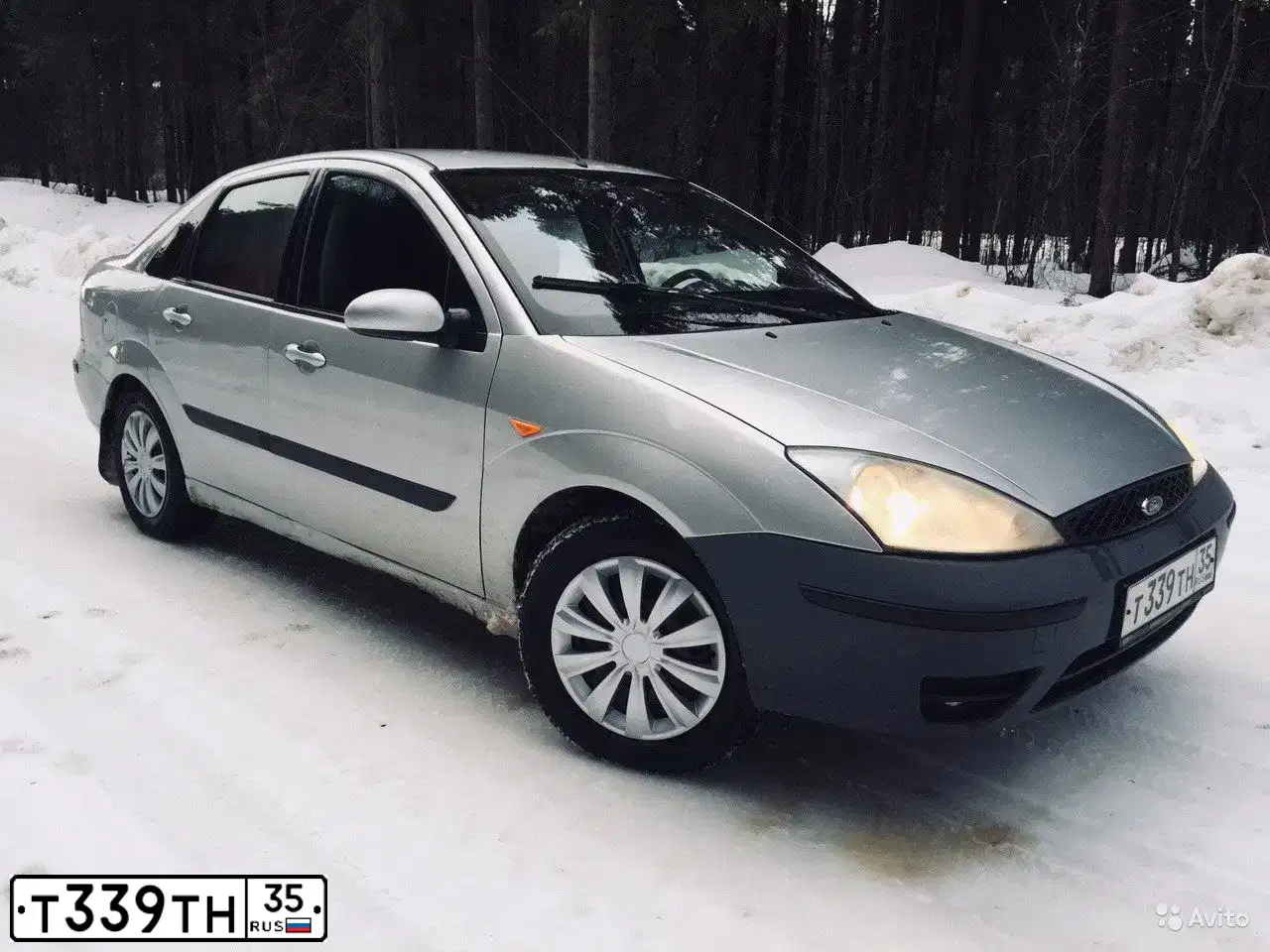 Фото автомобиля FORD FOCUS, 2004 — госномер Т339ТН35. Цвет: Серебристый