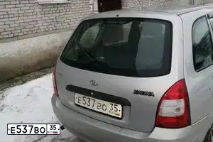 Фото автомобиля LADA 1117 KALINA, 2009 — госномер М756УЕ29. Цвет: Серебристый