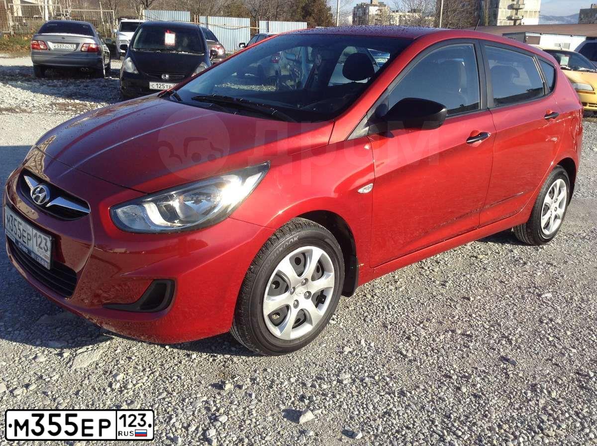 Фото автомобиля HYUNDAI SOLARIS, 2012 — госномер М355ЕР123. Цвет: КРАСНЫЙ ГРАНАТ
