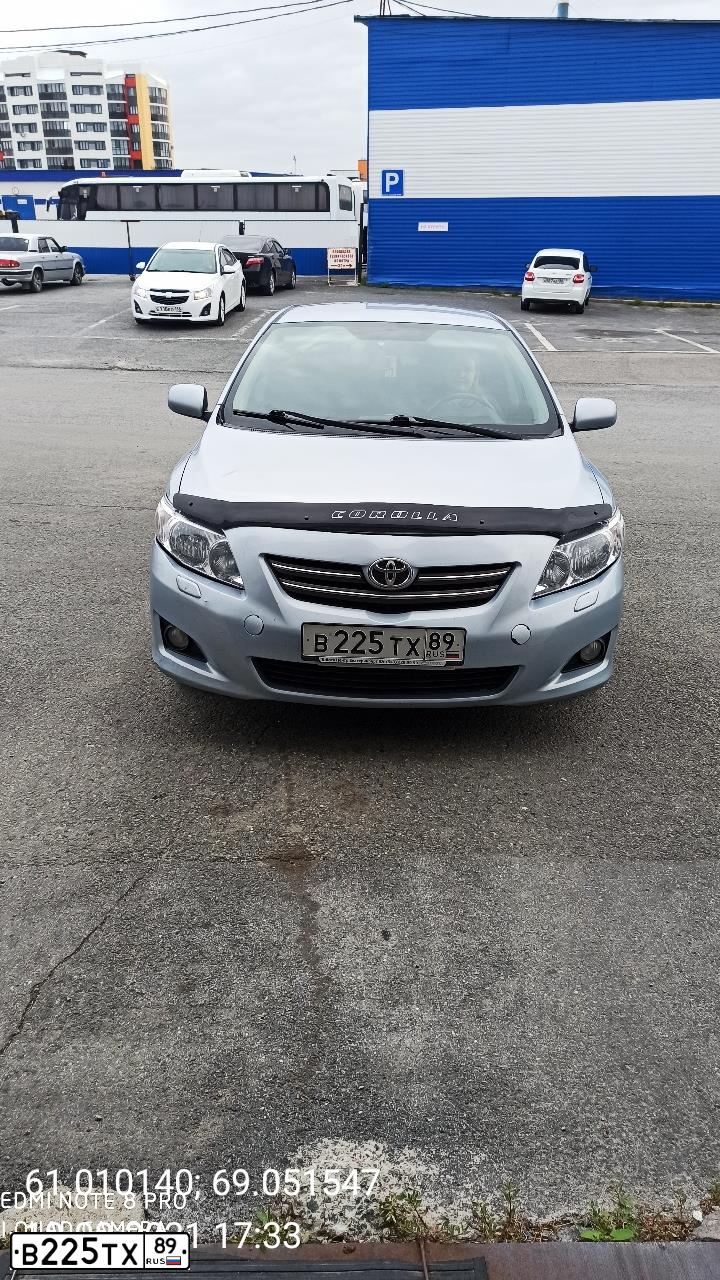 Фото автомобиля TOYOTA COROLLA, 2007 — госномер В225ТХ89. Цвет: СВЕТЛО-ГОЛУБОЙ