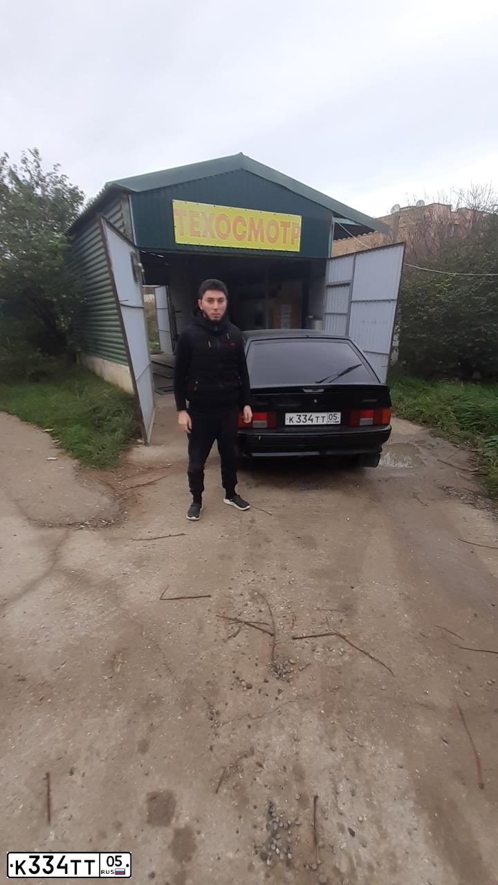 Фото автомобиля LADA 2114 SAMARA, 2010 — госномер К334ТТ05. Цвет: Темно-зеленый