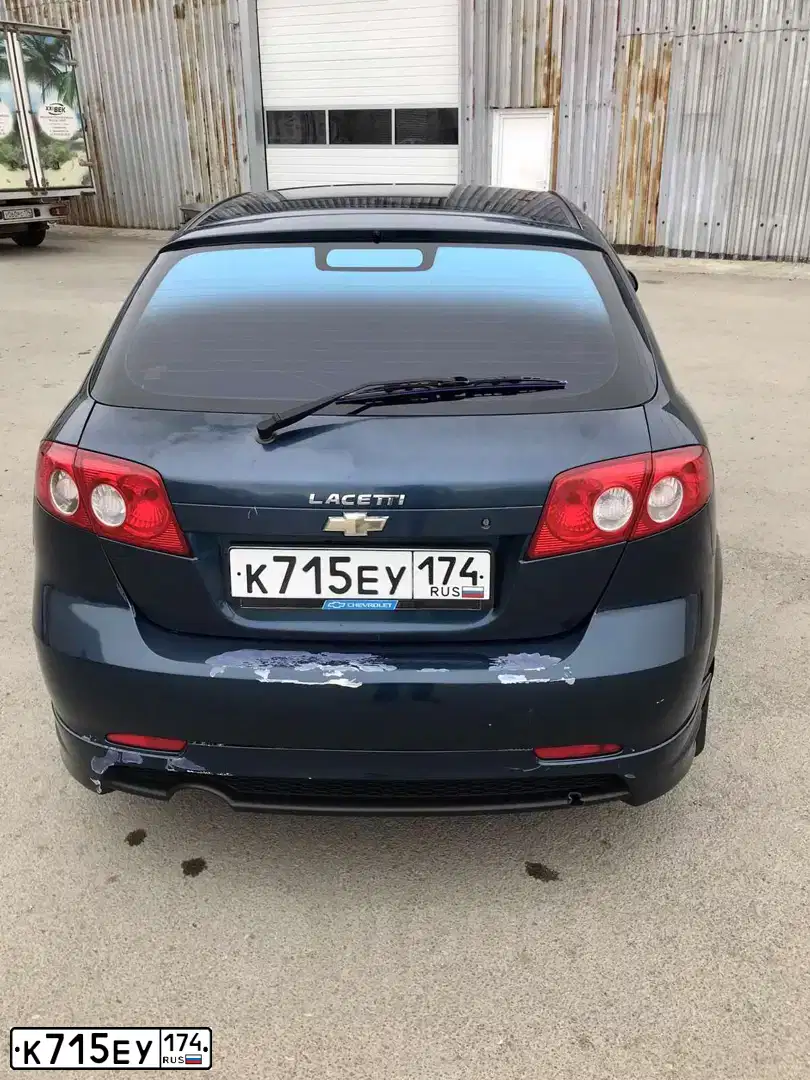Фото автомобиля CHEVROLET LACETTI, 2008 — госномер К715ЕУ174. Цвет: синий