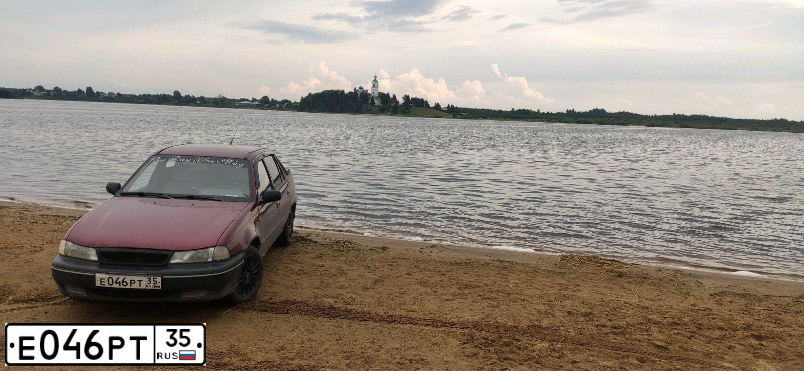 Фото автомобиля DAEWOO NEXIA, 2007 — госномер Т510МО35. Цвет: ВИШНЕВЫЙ