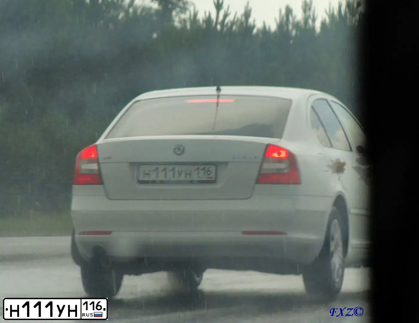 Фото автомобиля ШЕВРОЛЕ НИВА, 2005 — госномер К911ТК716. Цвет: Светло-Серебристый металлик