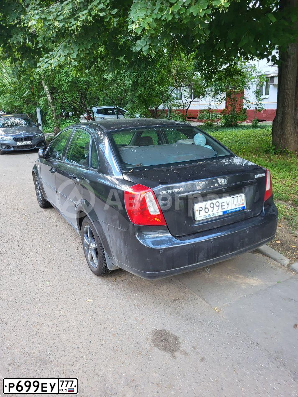 Фото автомобиля DAEWOO GENTRA, 2014 — госномер Р699ЕУ777. Цвет: ЧЕРНЫЙ БЛЕДНЫЙ