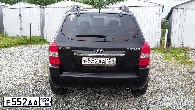 Фото автомобиля HYUNDAI TUCSON, 2008 — госномер Е552АА159. Цвет: ЧЕРНЫЙ