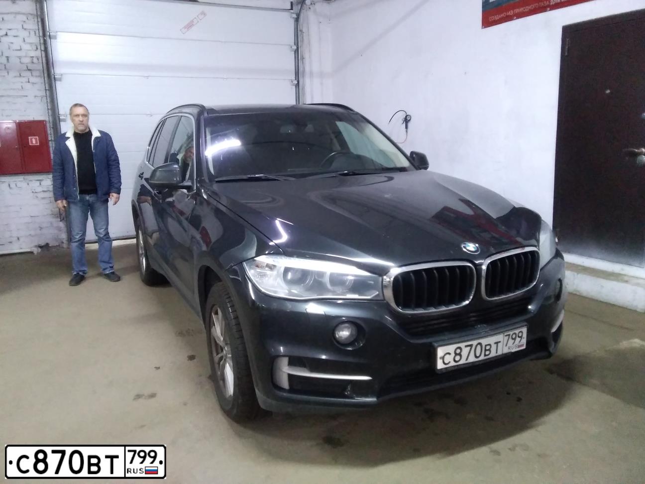 Фото автомобиля BMW X5, 2018 — госномер К013АХ977. Цвет: ЧЕРНЫЙ