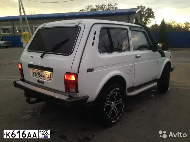 Фото автомобиля LADA 2121 NIVA, 2010 — госномер К537ХС48. Цвет: ТЕМНО-ВИШНЕВЫЙ