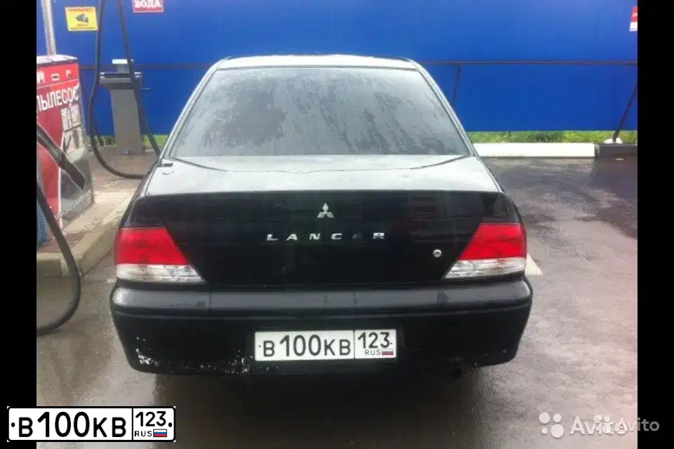 Фото автомобиля MITSUBISHI LANCER, 2006 — госномер В100КВ123. Цвет: ЧЕРНЫЙ