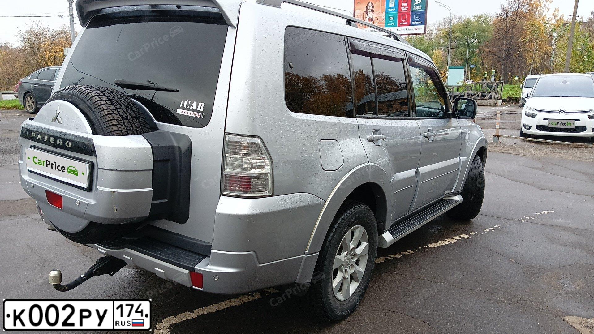 Фото автомобиля MITSUBISHI PAJERO, 2012 — госномер К002РУ174. Цвет: Серебристый
