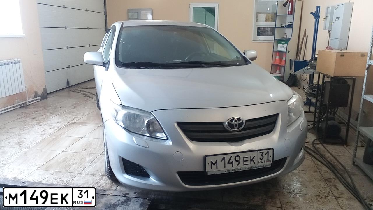 Фото автомобиля TOYOTA COROLLA, 2008 — госномер М149ЕК31. Цвет: Серый