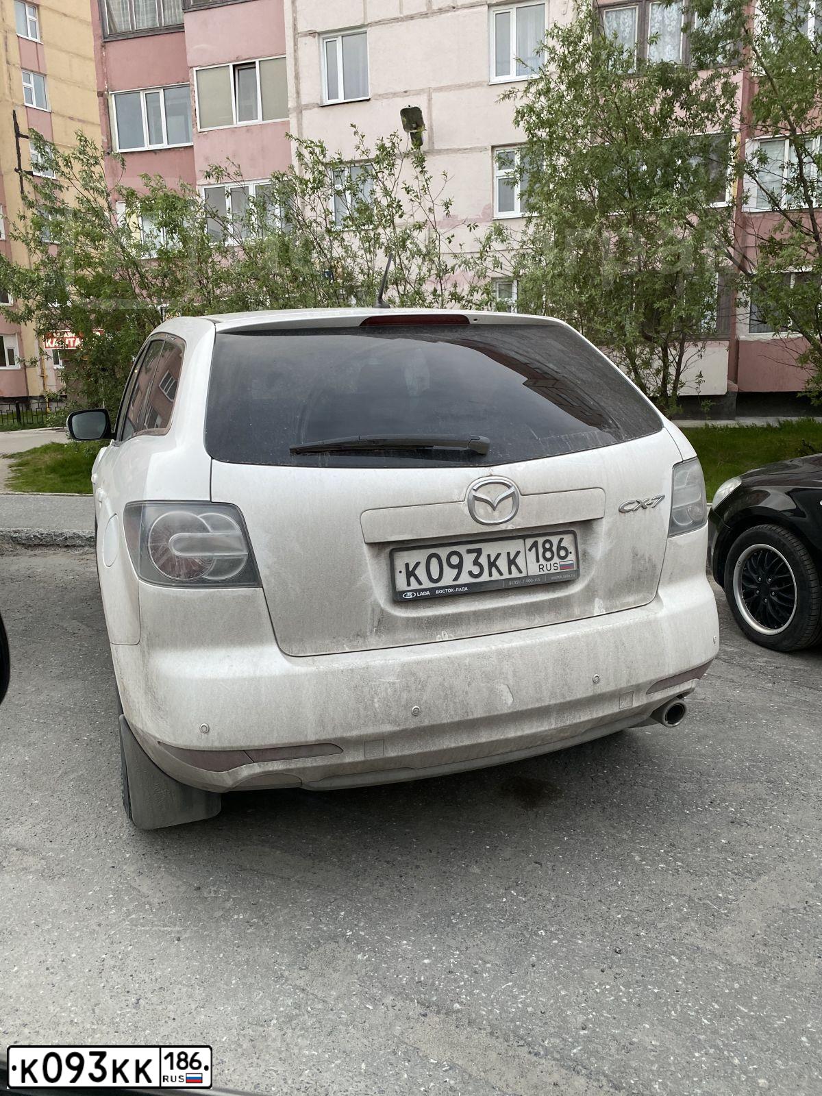Фото автомобиля MAZDA CX-7, 2011 — госномер С111СС174. Цвет: Белый
