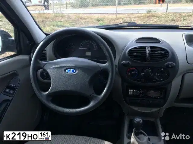 Фото автомобиля LADA 1117 KALINA, 2011 — госномер К219НО161. Цвет: СЕРЫЙ ТЕМНЫЙ