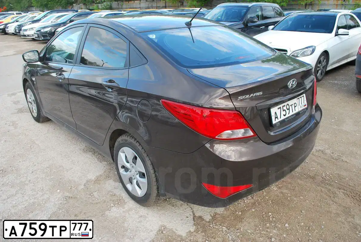 Фото автомобиля HYUNDAI SOLARIS, 2016 — госномер А759ТР777. Цвет: Коричневый