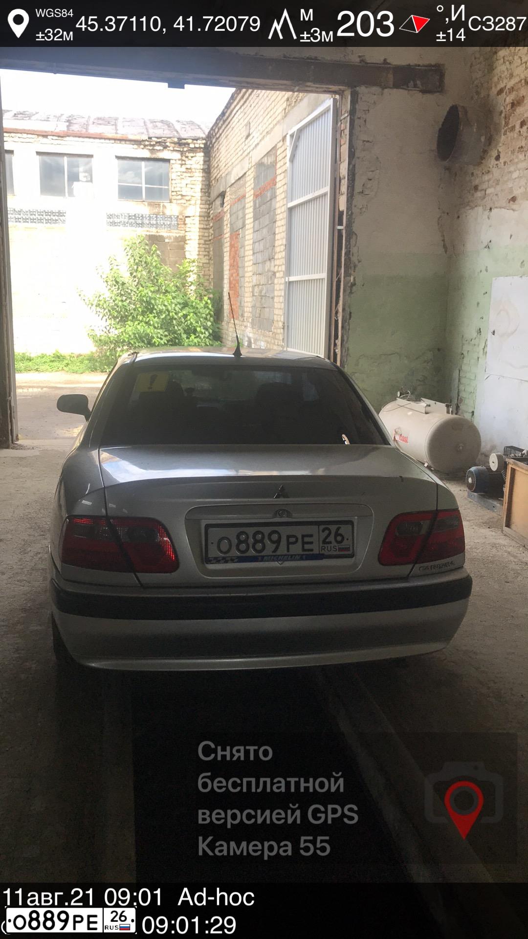 Фото автомобиля MITSUBISHI CARISMA, 2002 — госномер О889РЕ26. Цвет: СЕРЕБРИСТЫЙ