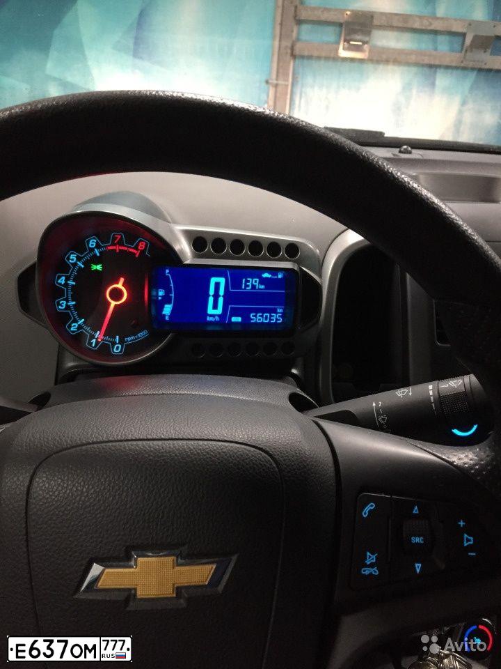 Фото автомобиля CHEVROLET AVEO, 2015 — госномер В031ВМ198. Цвет: ЧЕРНЫЙ МЕТАЛЛИК
