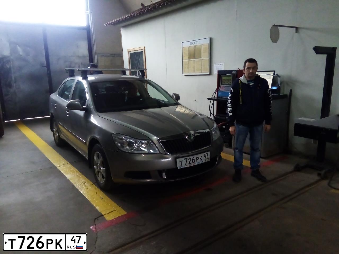 Фото автомобиля SKODA OCTAVIA, 2010 — госномер Т726РК47