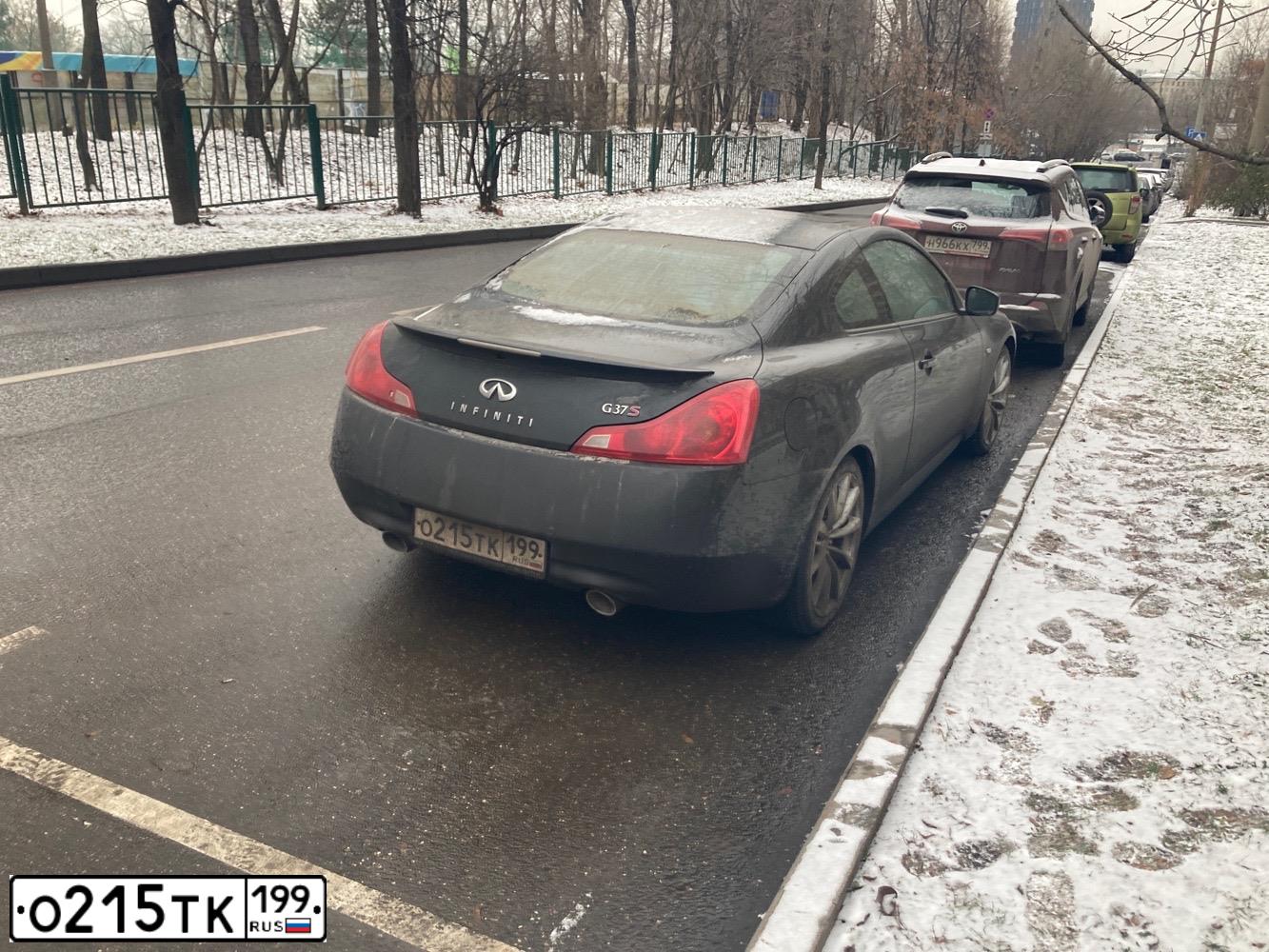 Фото автомобиля INFINITI G, 2009 — госномер О215ТК199. Цвет: ЧЕРНЫЙ