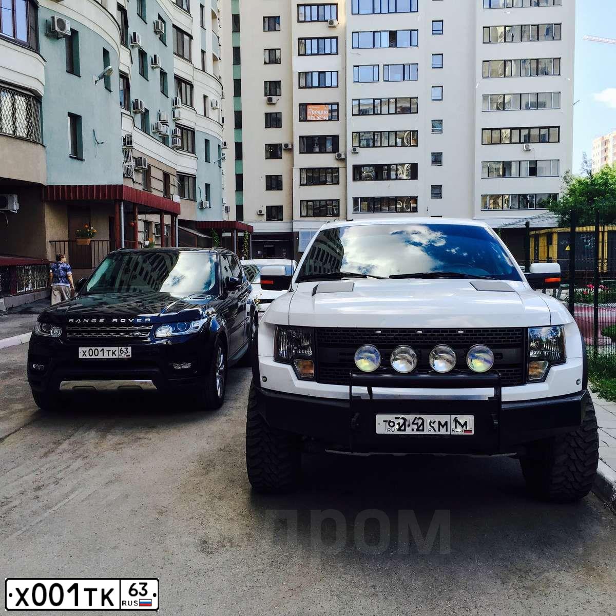 Фото автомобиля LANDROVER RANGE ROVER SPORT, 2011 — госномер Х001ТК63. Цвет: ТЕМНО-КОРИЧНЕВЫЙ