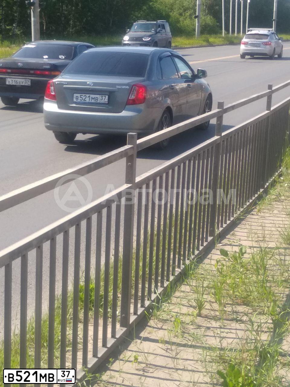 Фото автомобиля DAEWOO GENTRA, 2014 — госномер Р938МТ178. Цвет: ТЕМНО-СЕРЫЙ