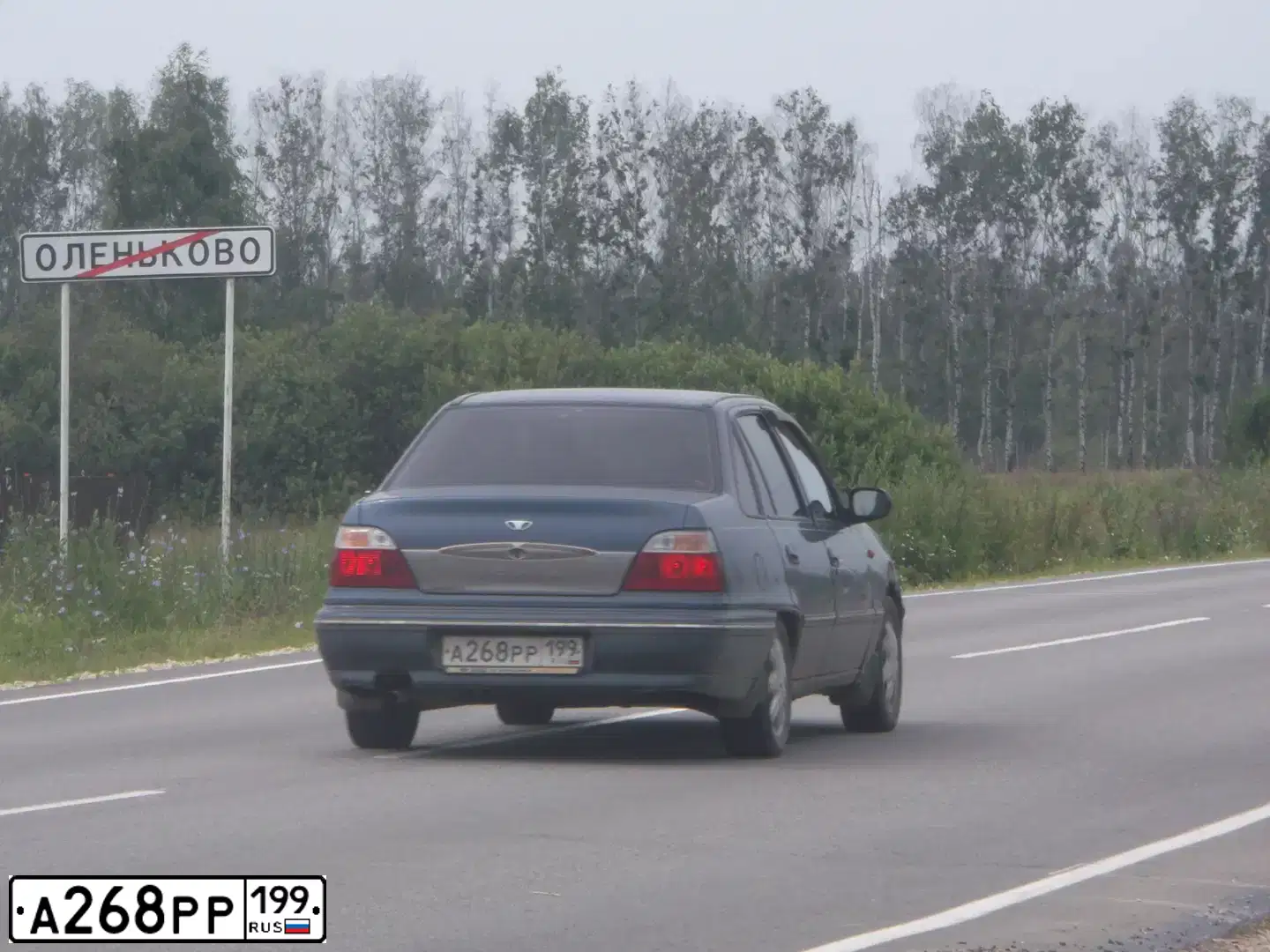 Фото автомобиля DAEWOO NEXIA, 2003 — госномер О938КС199. Цвет: СИНИЙ