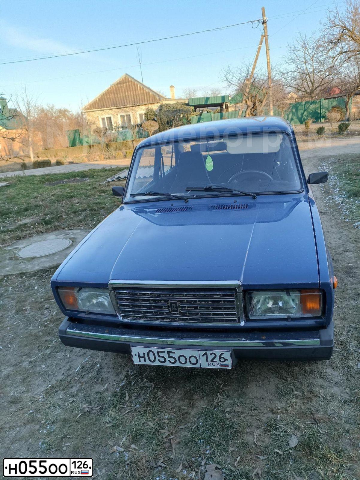 Фото автомобиля LADA 2107, 2007 — госномер Н246СТ15. Цвет: синий