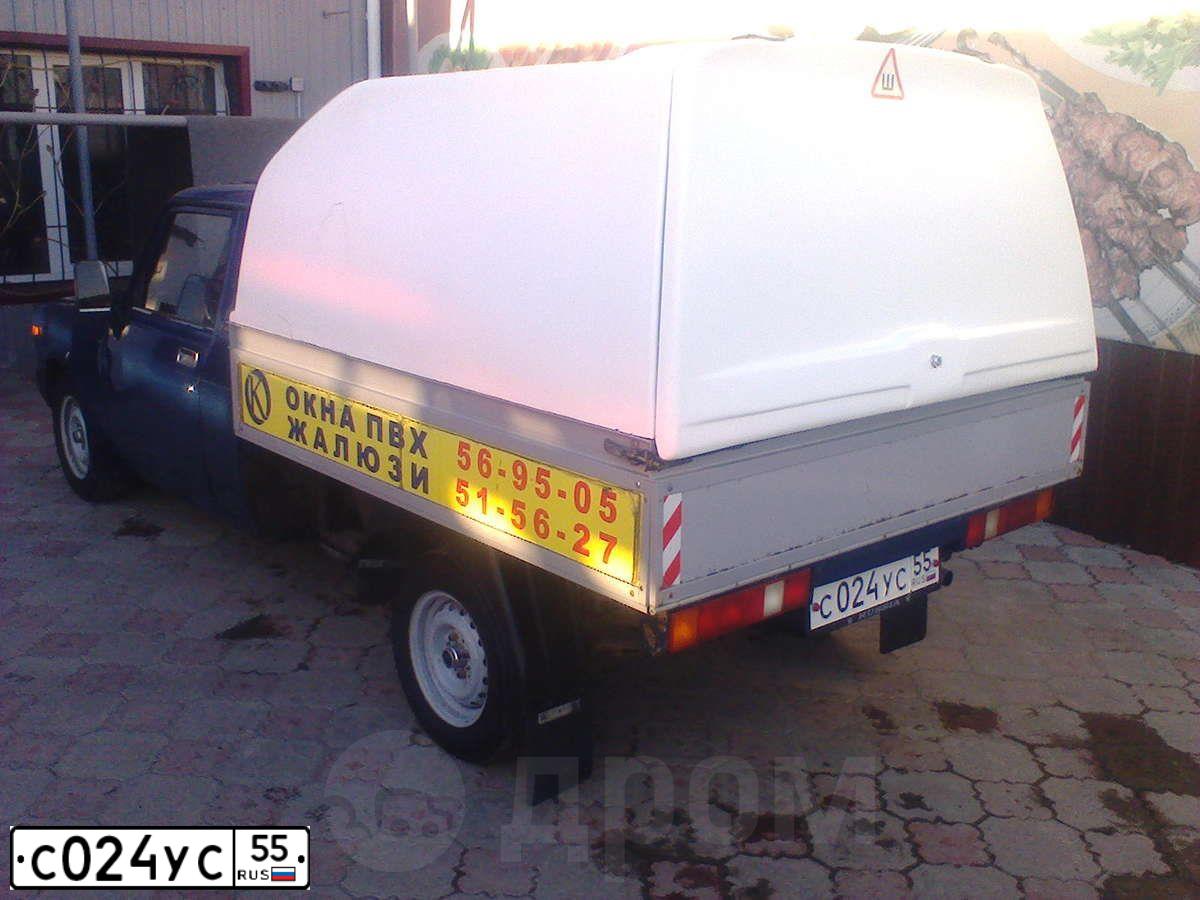 Фото автомобиля LADA 2345 WIS, 2008 — госномер С024УС55. Цвет: СИНИЙ