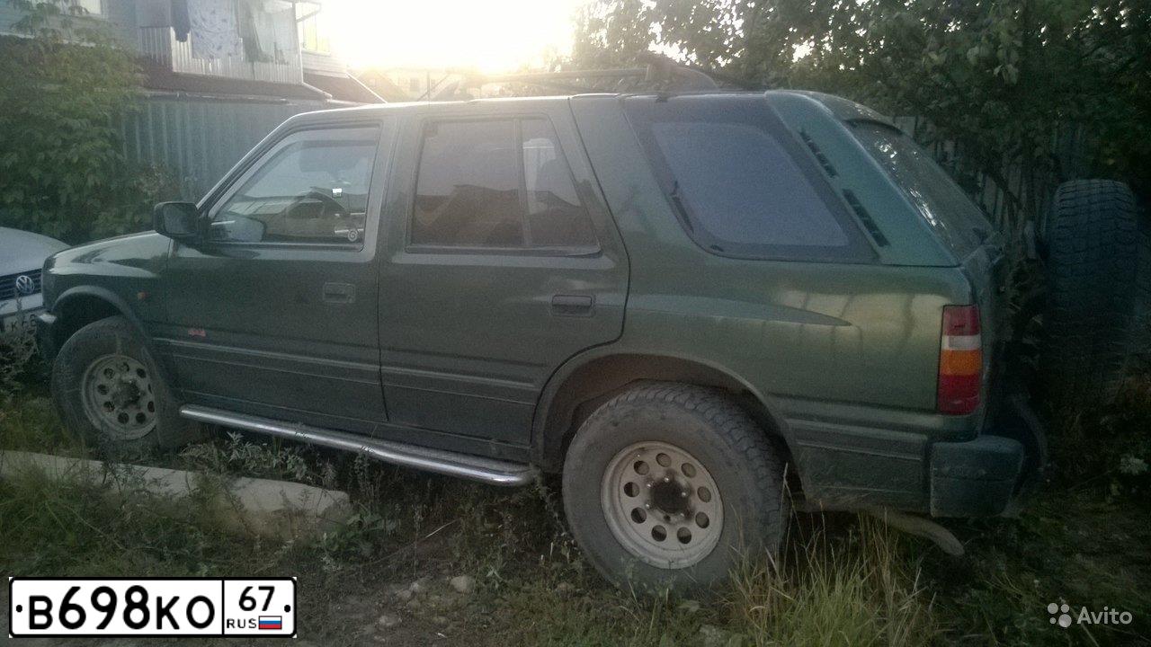 Фото автомобиля OPEL FRONTERA, 1993 — госномер В698КО67. Цвет: Темно-зеленый