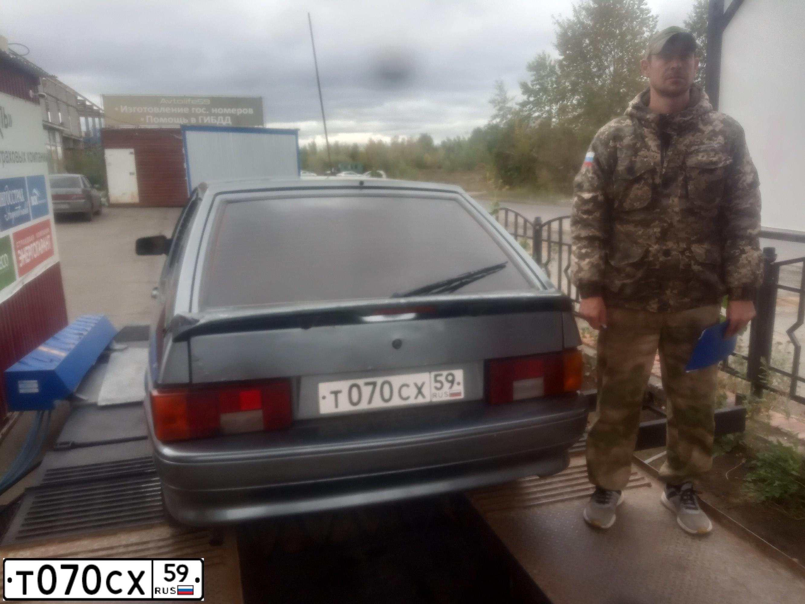 Фото автомобиля LADA 2113 SAMARA, 2010 — госномер Т070СХ59. Цвет: СРЕДНИЙ СЕРО ЗЕЛЕНЫЙ МЕТА
