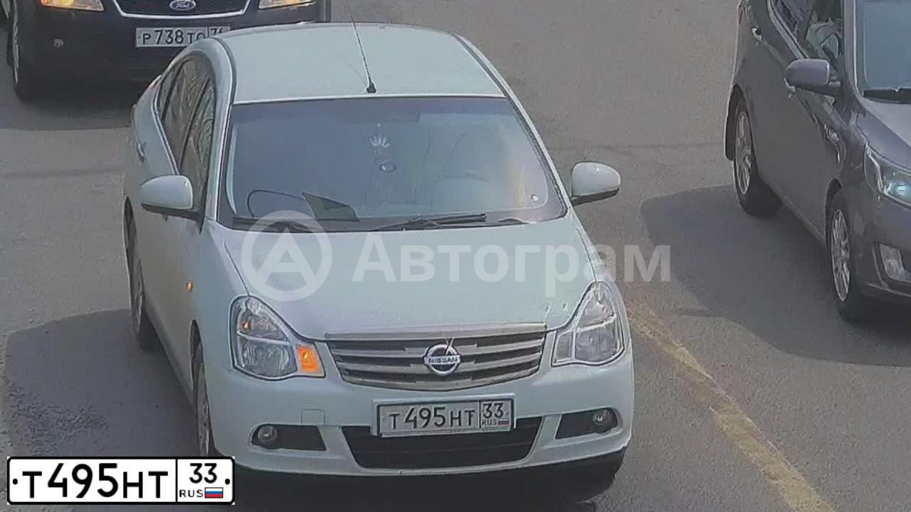 Фото автомобиля NISSAN ALMERA /AVTOVAZ/, 2013 — госномер Т495НТ33. Цвет: Белый