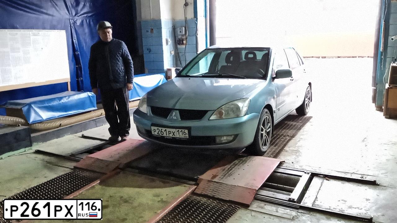 Фото автомобиля MITSUBISHI LANCER, 2007 — госномер С972АС68. Цвет: СВЕТЛО-СЕРО-ЗЕЛЕНЫЙ