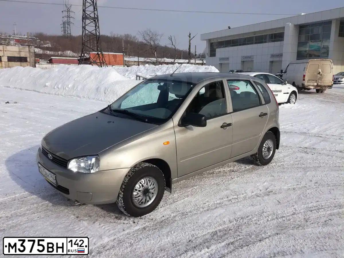 Фото автомобиля LADA 1119 KALINA, 2013 — госномер М375ВН142. Цвет: СЕРО-БЕЖЕВЫЙ