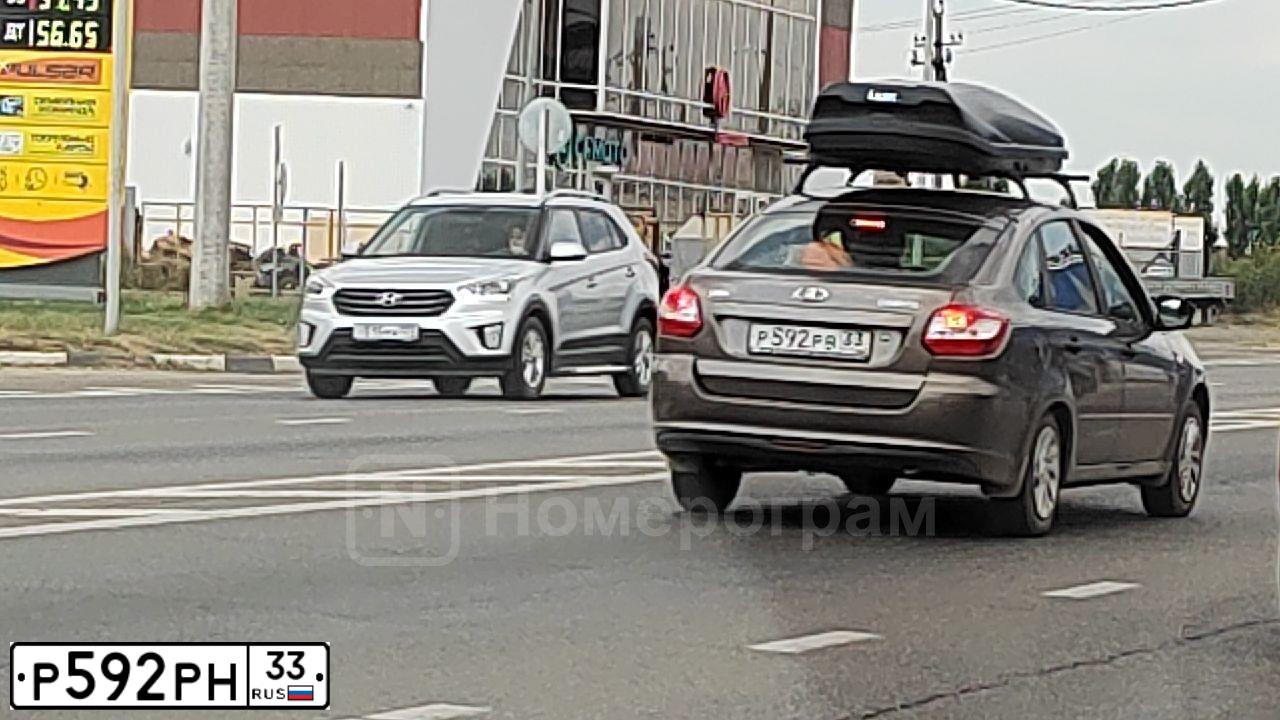 Фото автомобиля SKODA RAPID, 2018 — госномер Р592РН33. Цвет: КОРИЧНЕВЫЙ