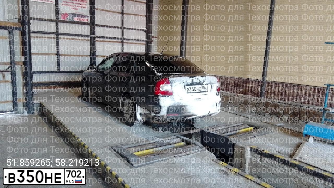 Фото автомобиля SKODA OCTAVIA, 2009 — госномер В350НЕ702. Цвет: ЧЕРНЫЙ