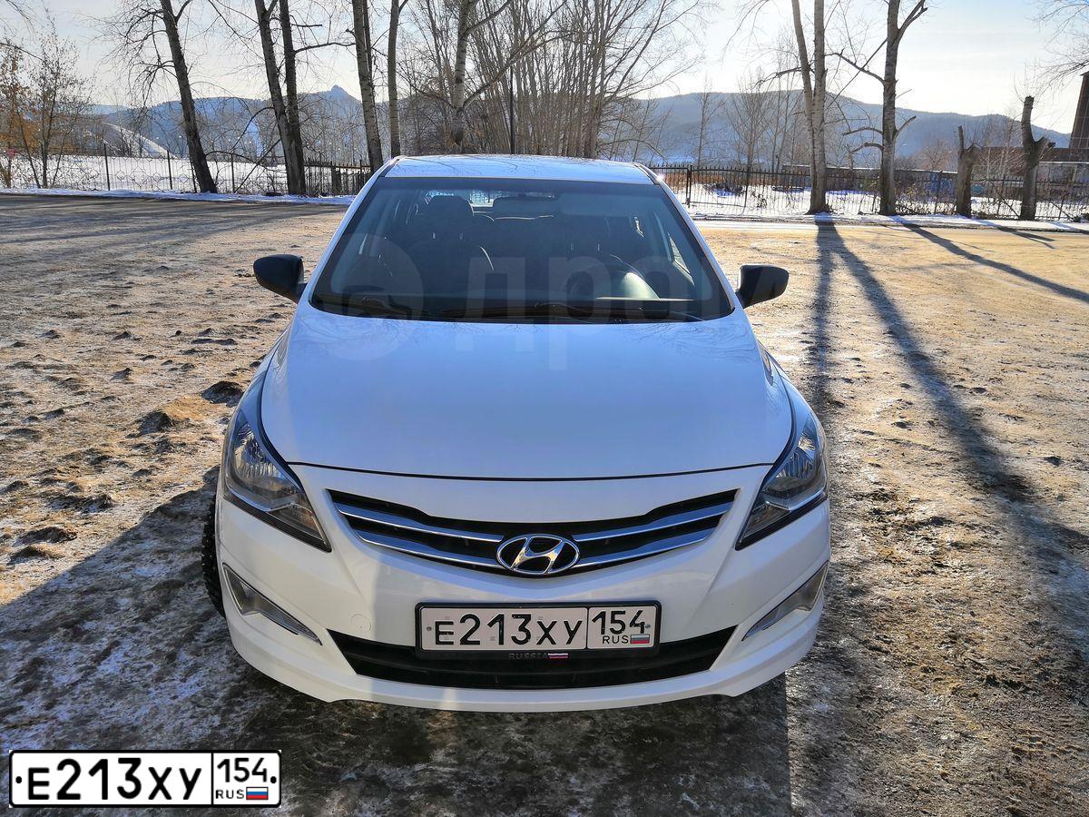 Фото автомобиля HYUNDAI SOLARIS, 2015 — госномер Х659РТ124. Цвет: Белый
