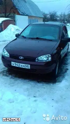 Фото автомобиля LADA KALINA, 2013 — госномер Р275ОА68. Цвет: ТЕМНО-ВИШНЕВЫЙ