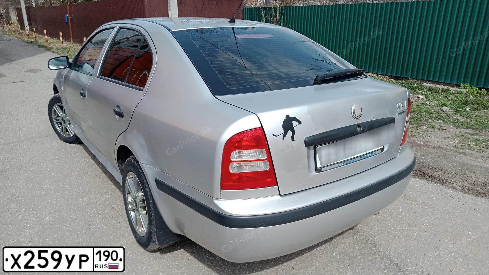 Фото автомобиля SKODA OCTAVIA, 2004 — госномер Х259УР190. Цвет: БЕЛЫЙ (СЕРЕБРИСТЫЙ)