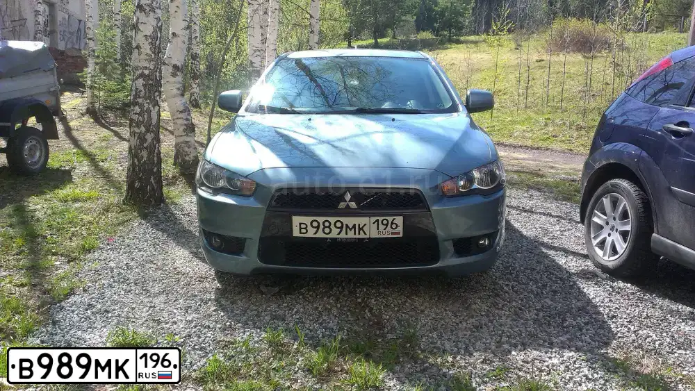 Фото автомобиля MITSUBISHI LANCER, 2008 — госномер В989МК196. Цвет: СВЕТЛО-ЗЕЛЕНЫЙ