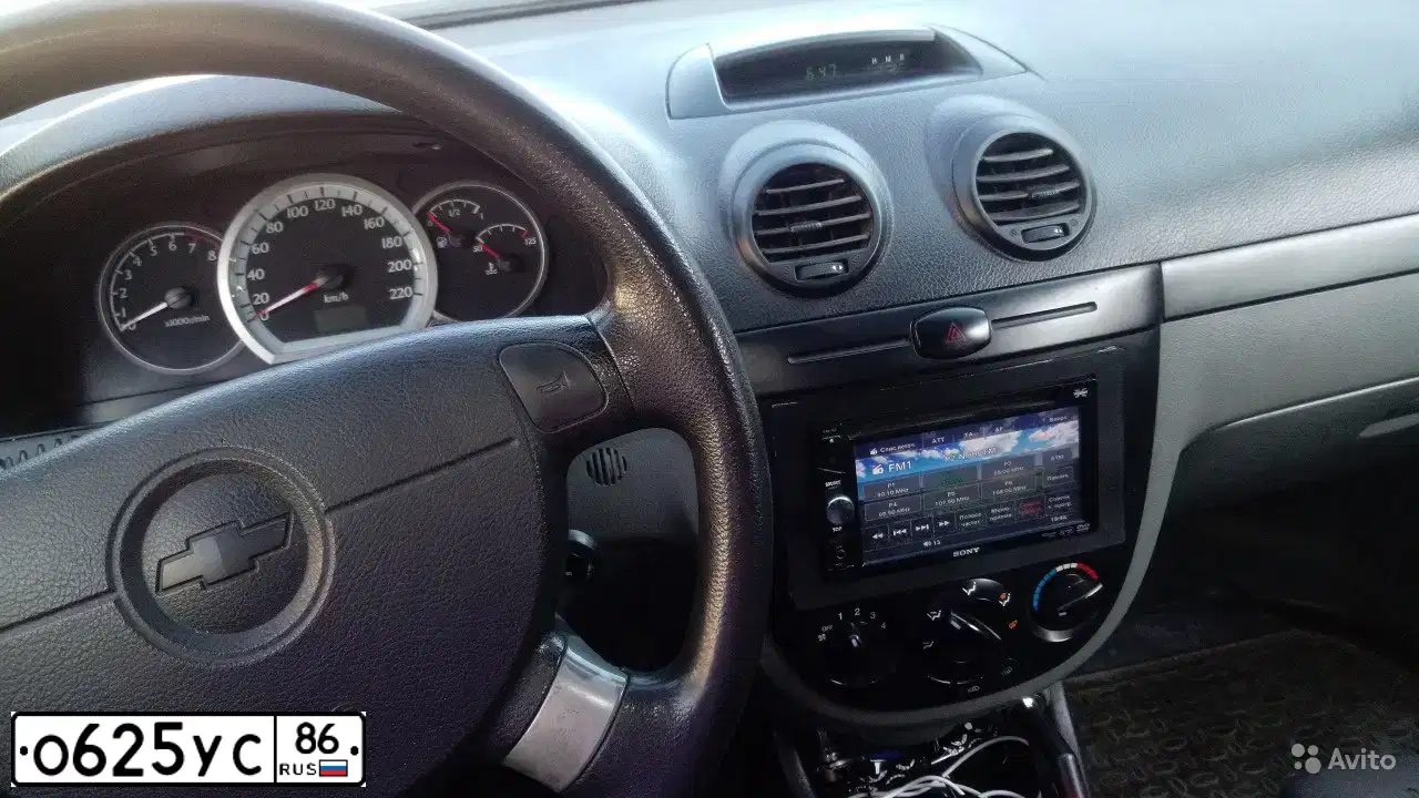 Фото автомобиля CHEVROLET LACETTI, 2010 — госномер Н069АС196. Цвет: голубой