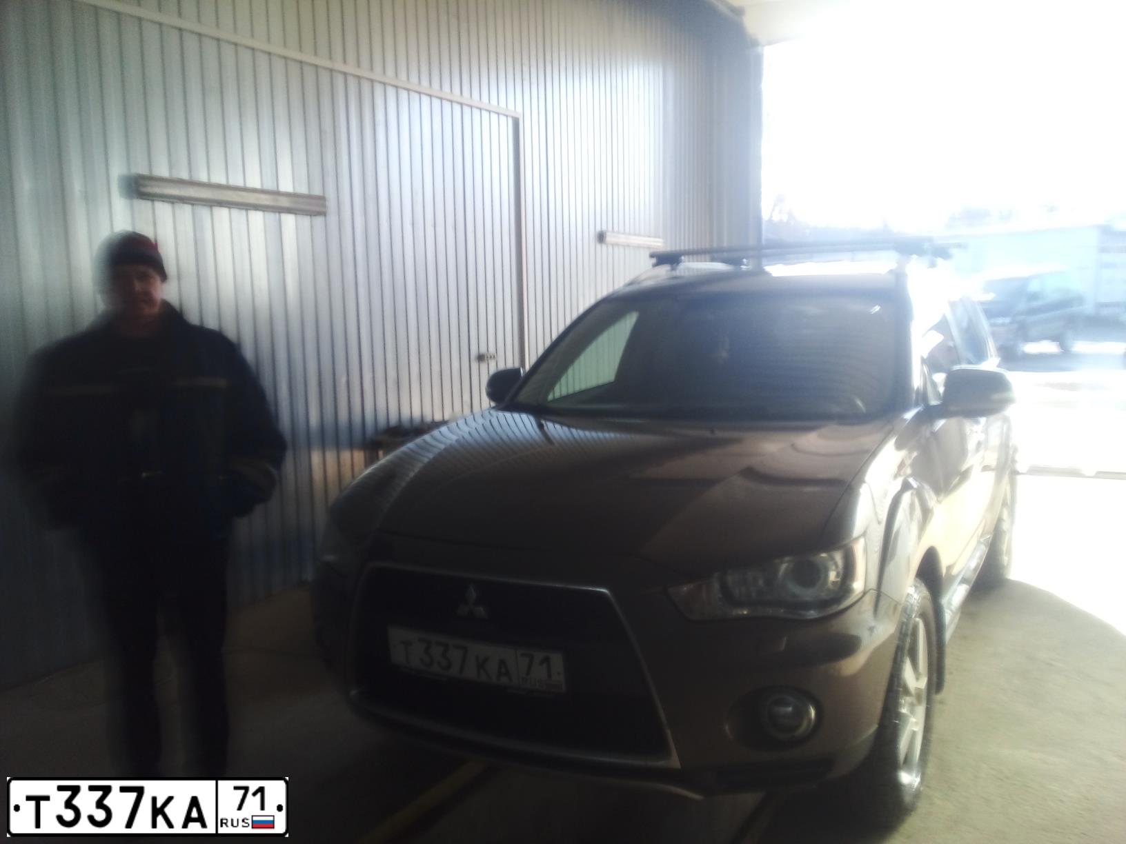 Фото автомобиля MITSUBISHI OUTLANDER, 2010 — госномер К217РР71. Цвет: Коричневый
